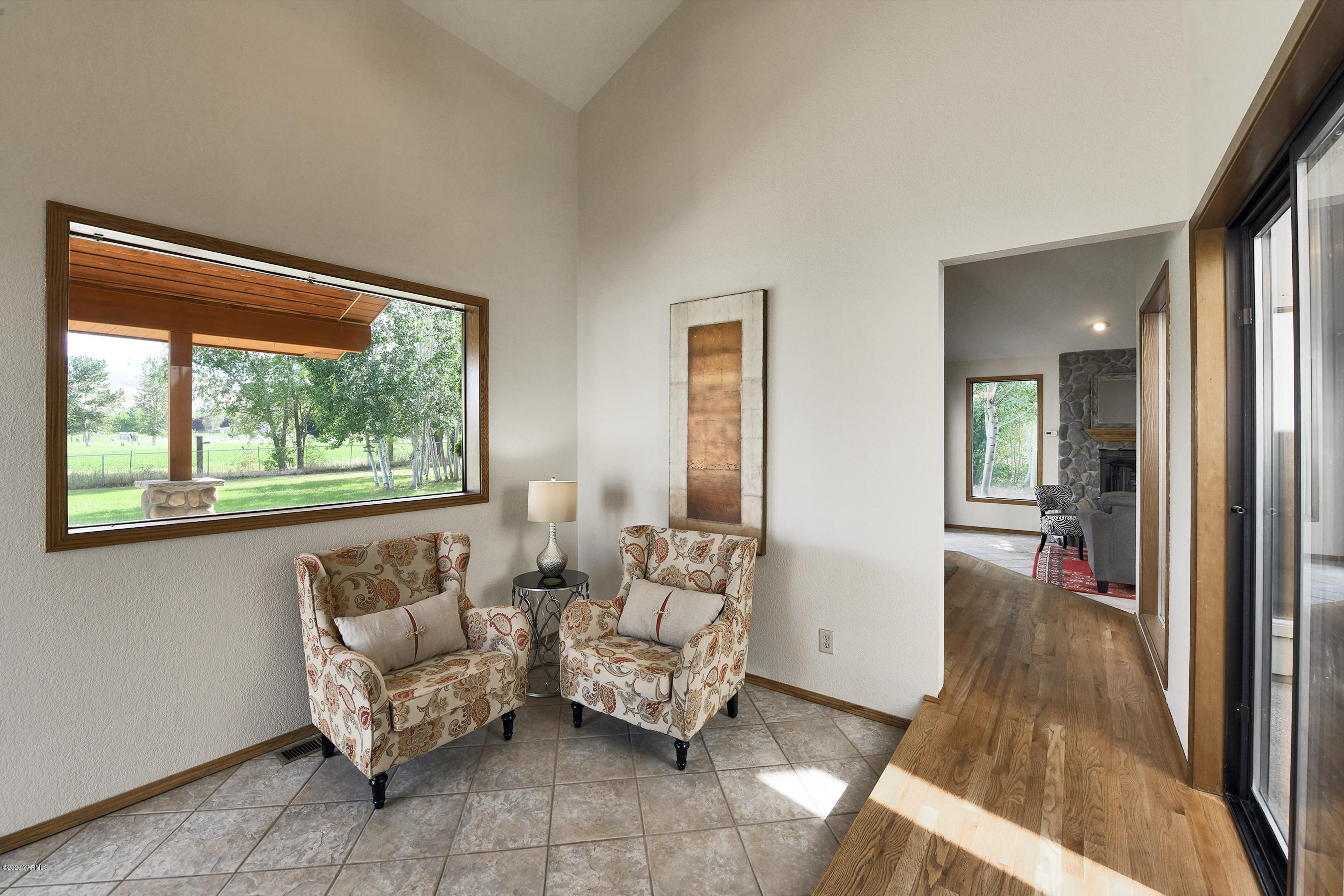 13010 Rutherford Road Yakima, WA 98903 - Photo 13 of 39 a living room with furniture and a large window