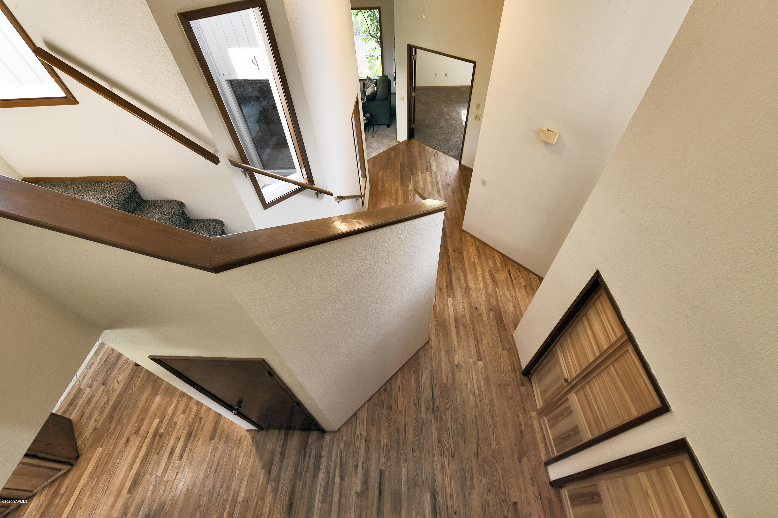 13010 Rutherford Road Yakima, WA 98903 - Photo 14 of 39 a view of staircase with railing and white walls