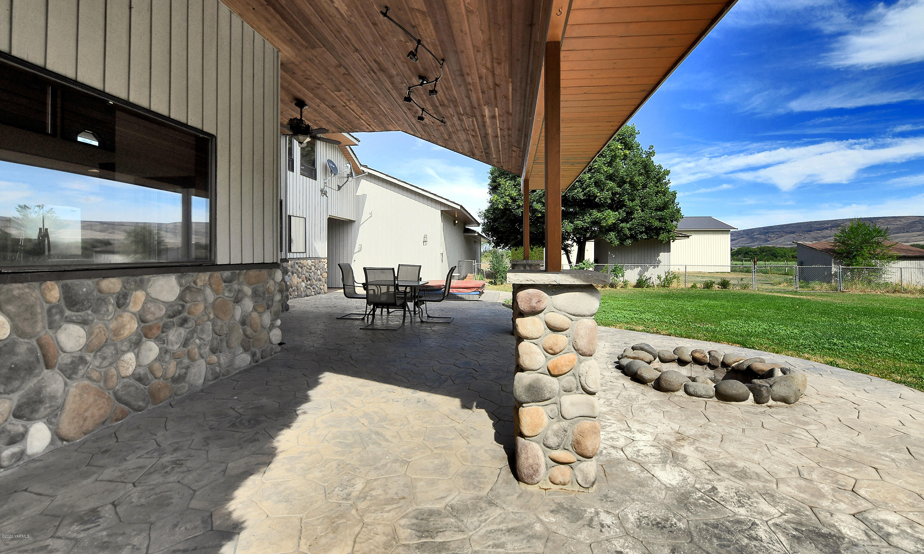 13010 Rutherford Road Yakima, WA 98903 - Photo 32 of 39 a view of backyard of the house with outdoor seating