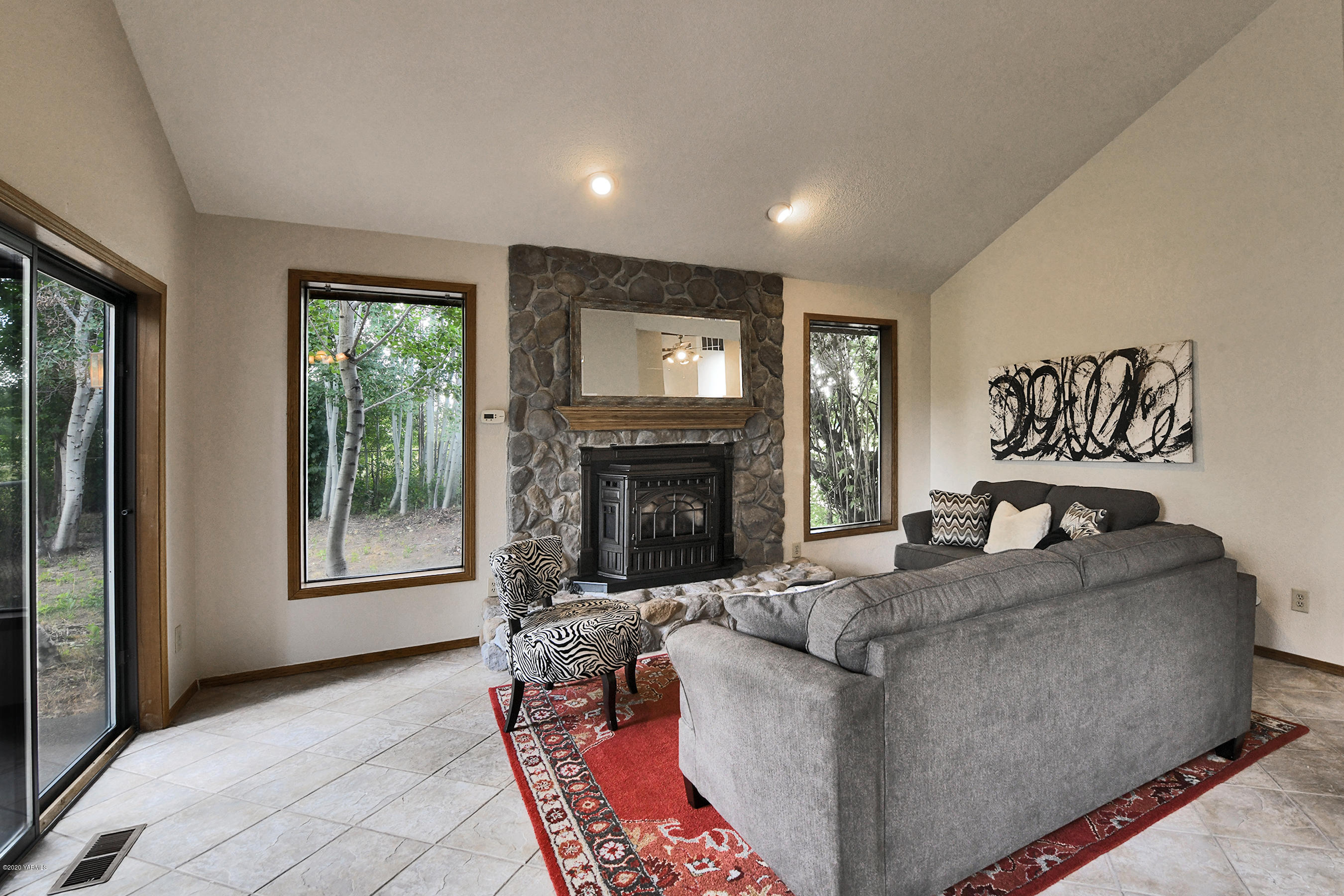 13010 Rutherford Road Yakima, WA 98903 - Photo 6 of 39 a living room with furniture and a fireplace