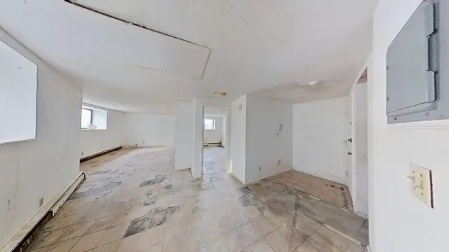 a kitchen that has a sink and a stove