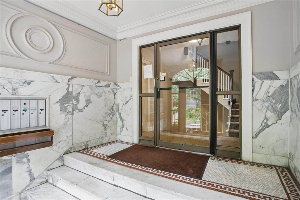 30 Kinross Road, Unit 1 Boston, MA 02135 - Photo 5 of 17 a front view of a house