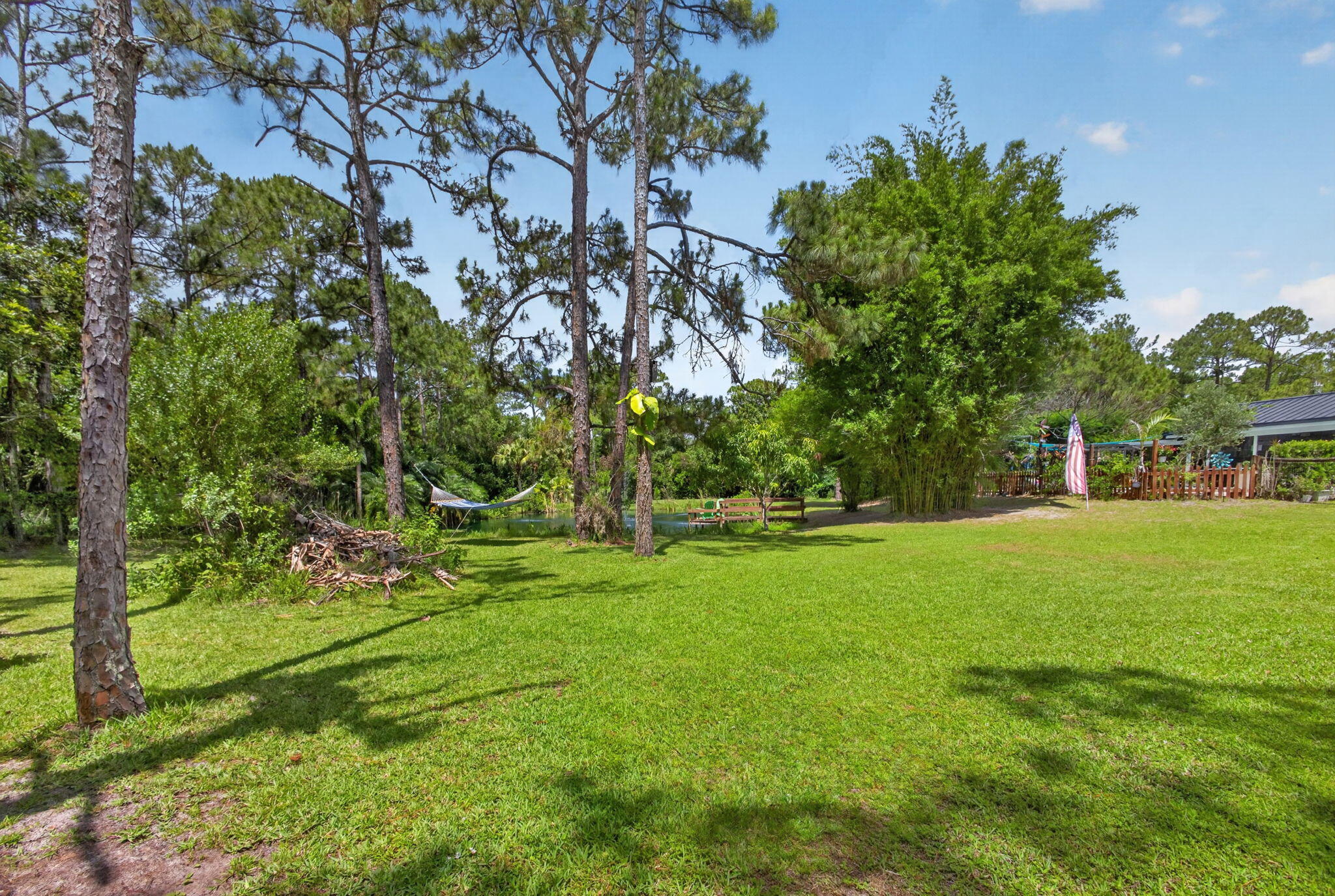 12558 165th Road North Jupiter, FL 33478 - Photo 16 of 67 a view of yard with green space