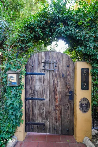 a view of a backyard with sitting area