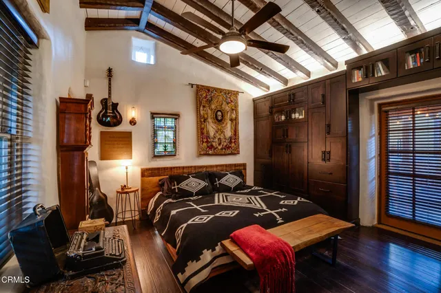 a view of a gym with trees in front of it