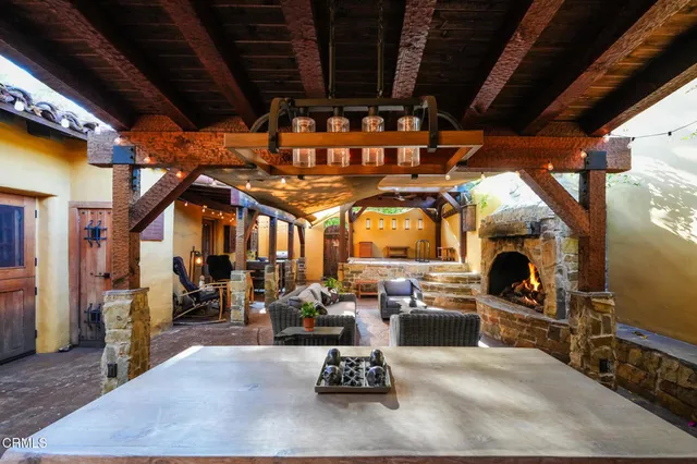 a view of path in between the bunch of plants and trees