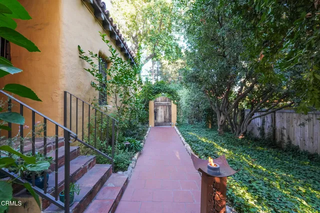 a house view with a garden space