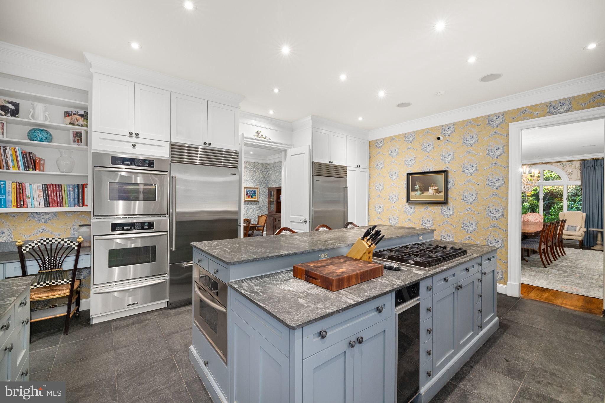 1111 Crest Lane McLean, VA 22101 - Photo 15 of 61 a kitchen with a stove and a refrigerator