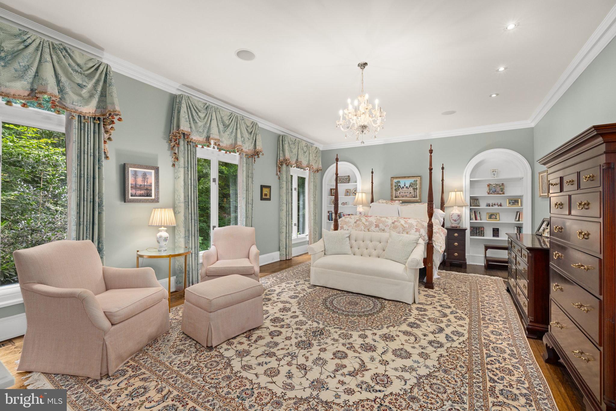 1111 Crest Lane McLean, VA 22101 - Photo 21 of 61 a living room with furniture and a chandelier