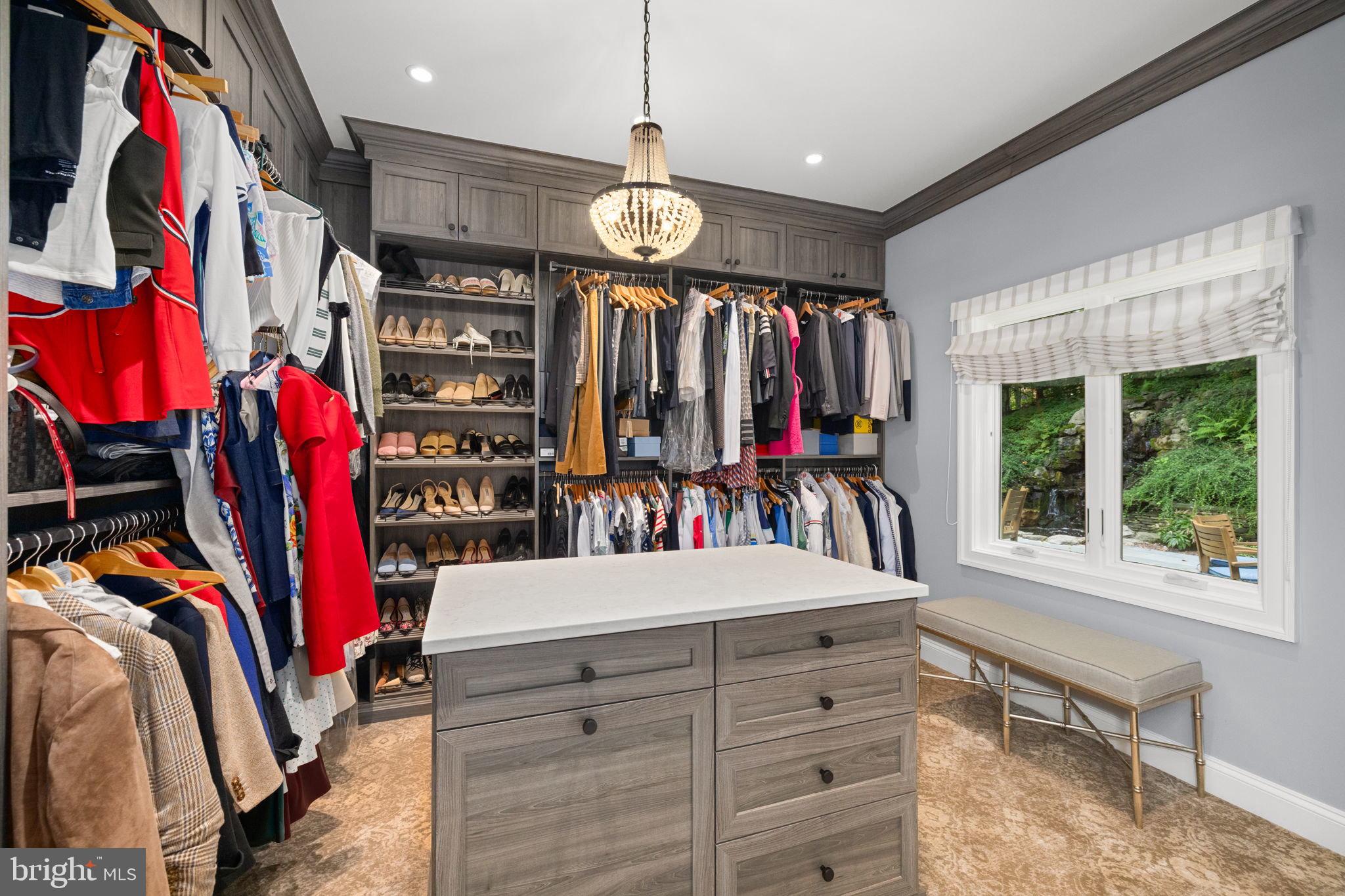1111 Crest Lane McLean, VA 22101 - Photo 27 of 61 a view of walk in closet with clothes and shoes