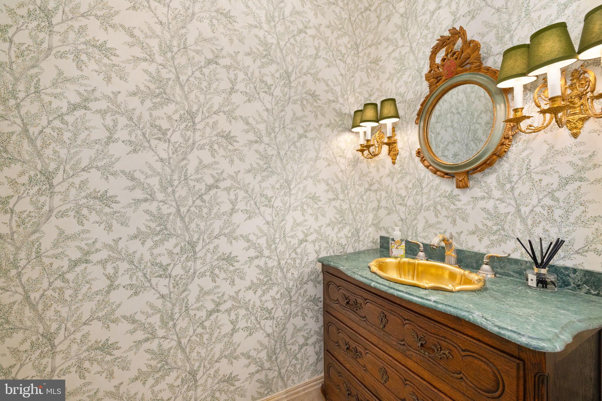1111 Crest Lane McLean, VA 22101 - Photo 28 of 61 a bathroom with a sink and a mirror