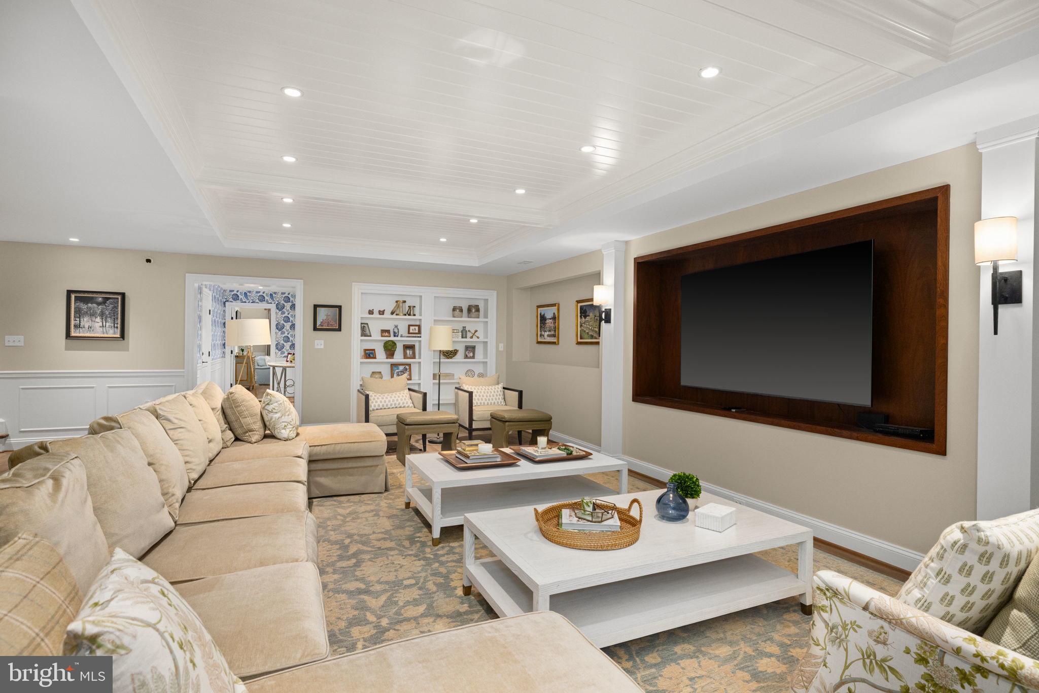 1111 Crest Lane McLean, VA 22101 - Photo 40 of 61 a living room with furniture and a flat screen tv