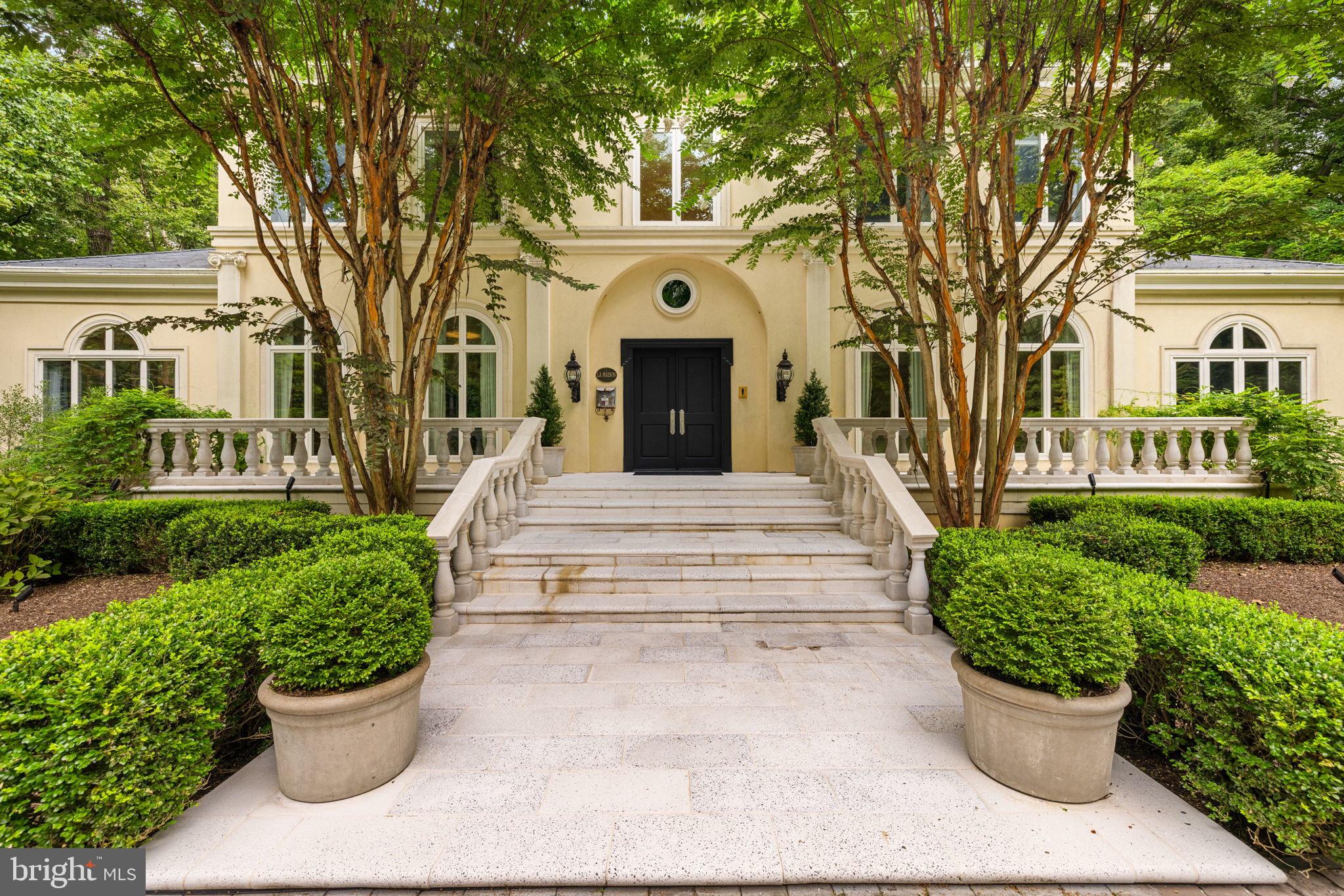 1111 Crest Lane McLean, VA 22101 - Photo 4 of 61 a front view of a house with a garden