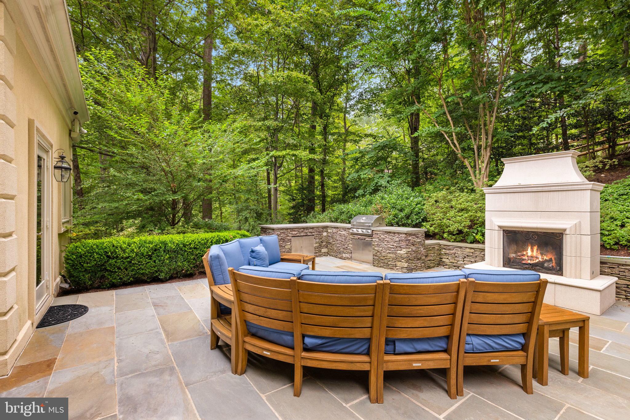 1111 Crest Lane McLean, VA 22101 - Photo 56 of 61 a view of a patio with a table and chairs