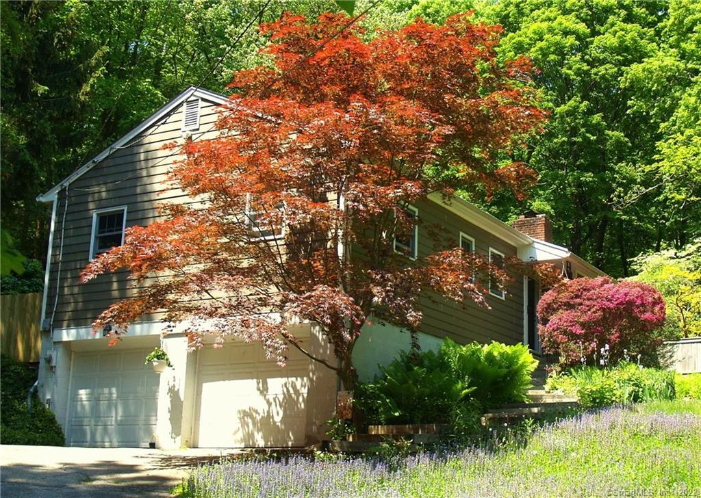 466 Branchville Road Ridgefield, CT 06877 - Photo 1 of 1 a backyard of a house with lots of green space