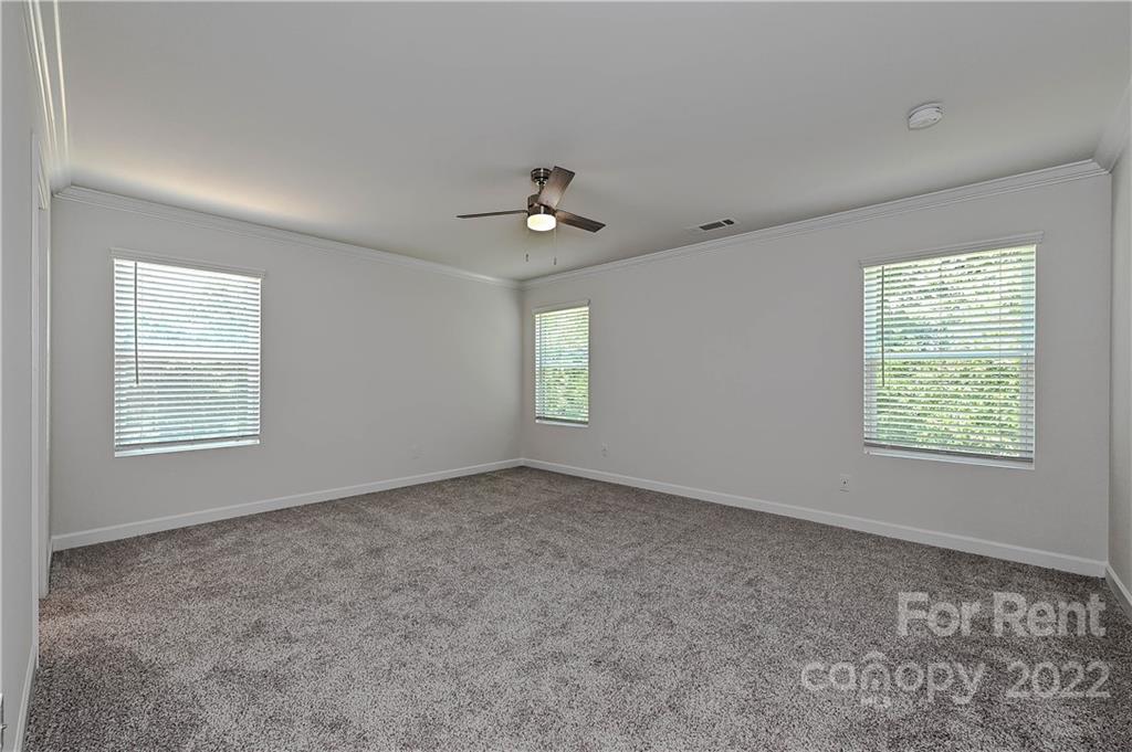 3534 Auburn Curb Road Charlotte, NC 28217 - Photo 7 of 11 a view of an empty room with a window