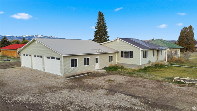 165 Main Street Georgetown, ID 83239 - Photo 41 of 50 Single story home featuring a garage and driveway