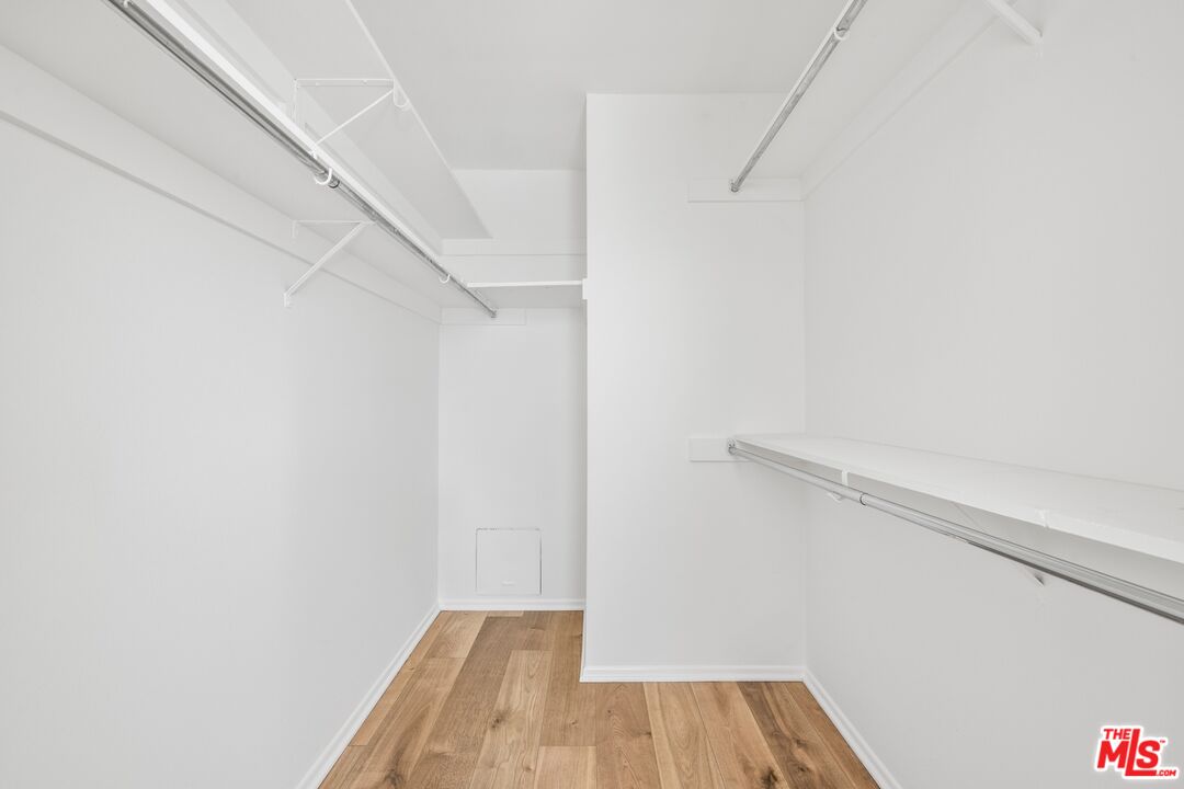 12720 Burbank Boulevard, Unit 318 Valley Village, CA 91607 - Photo 10 of 12 a view of small space with racks on the wall