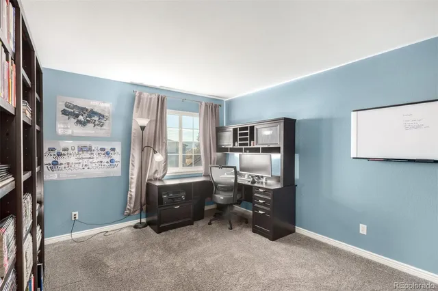 a room with furniture and a flat screen tv