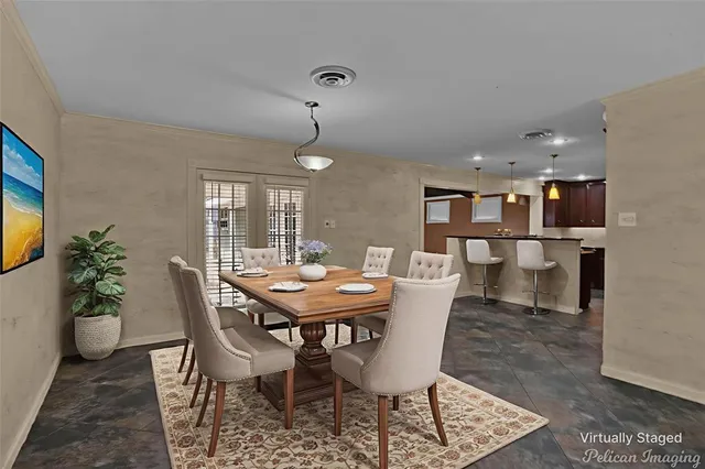a view of a dining room with furniture
