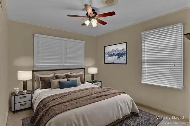 a bedroom with bed and a window