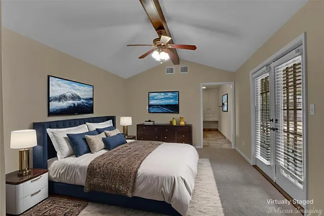 a bedroom with bed and wooden floor