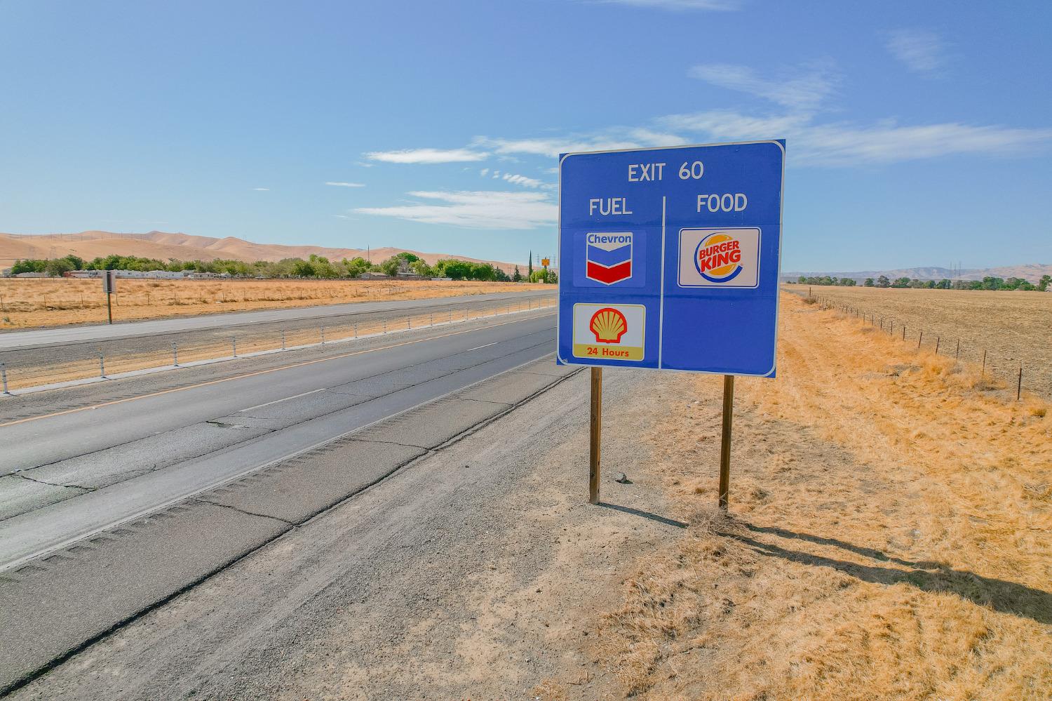 28900 Gonzaga Road Santa Nella, CA 95322 - Photo 8 of 11 a sign that is on the side of a road