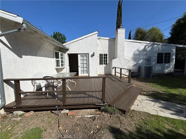 a swimming pool with wooden fence