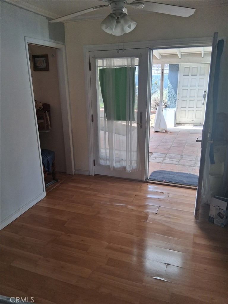3631 La Costa Place Oxnard, CA 93033 - Photo 9 of 11 a view of a room with wooden floor and window