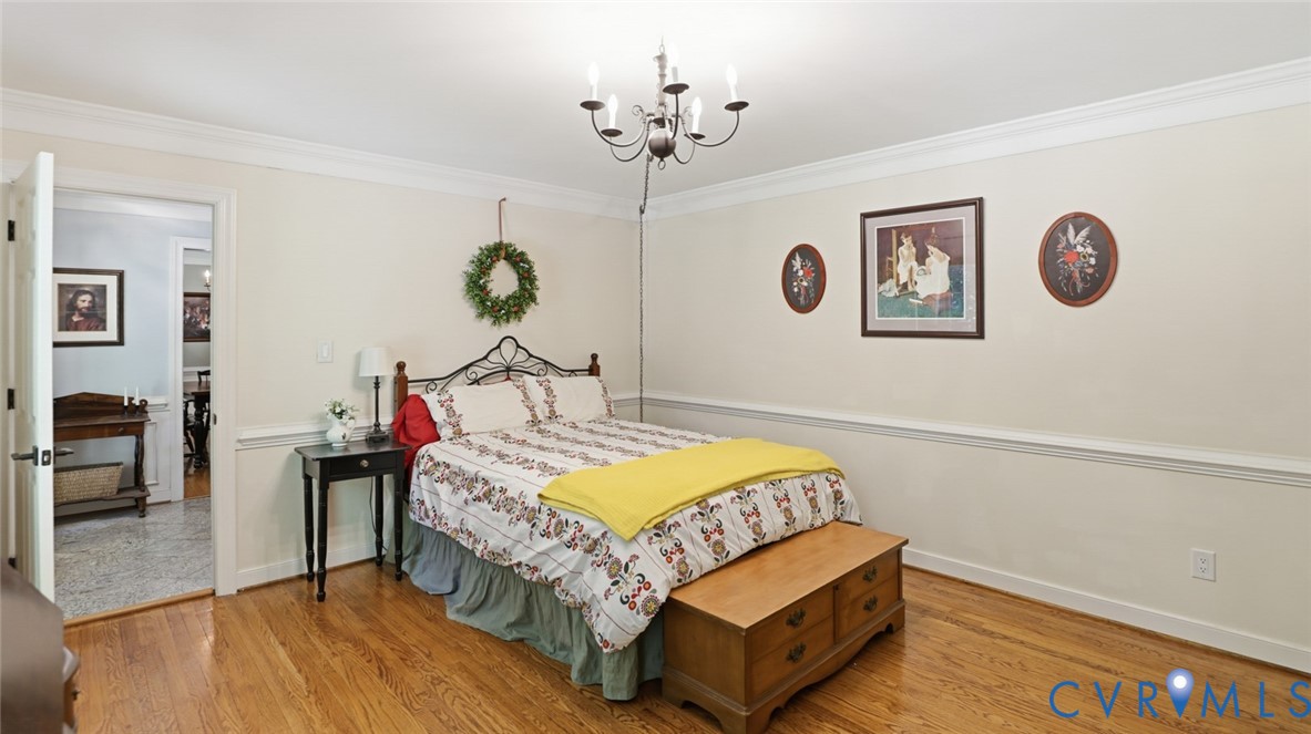 10716 Chalkley Road Richmond, VA 23237 - Photo 13 of 46 a bedroom with bed and a window