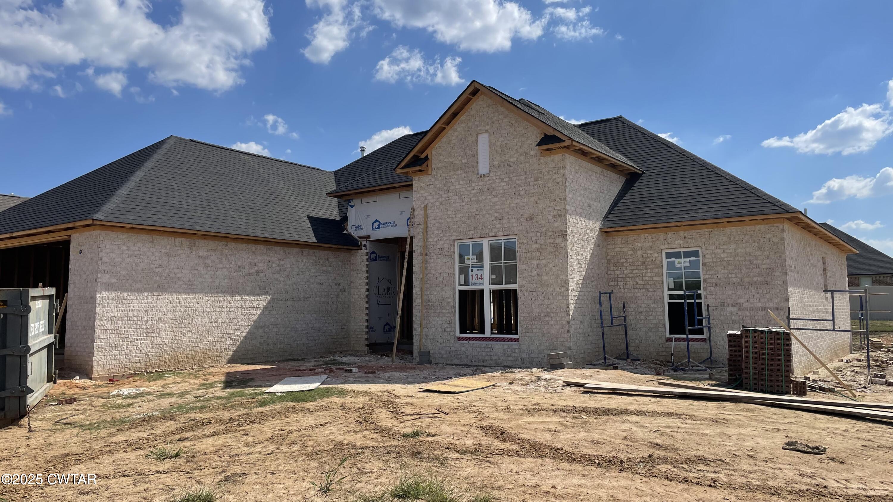 134 Daybreak Loop Medina, TN 38355 - Photo 2 of 6 a front view of a house with a yard