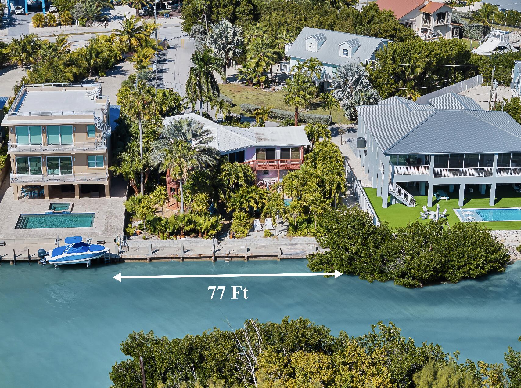 42 Treasure Road Marathon, FL 33050 - Photo 14 of 70 an aerial view of a house with a garden and lake view
