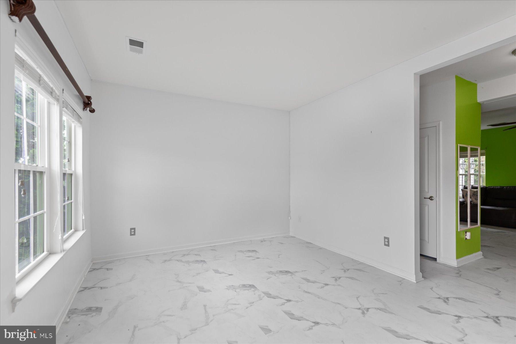 152 Bobbys Branch Road, Unit 68 Millsboro, DE 19966 - Photo 6 of 57 View Living Room into Family Room