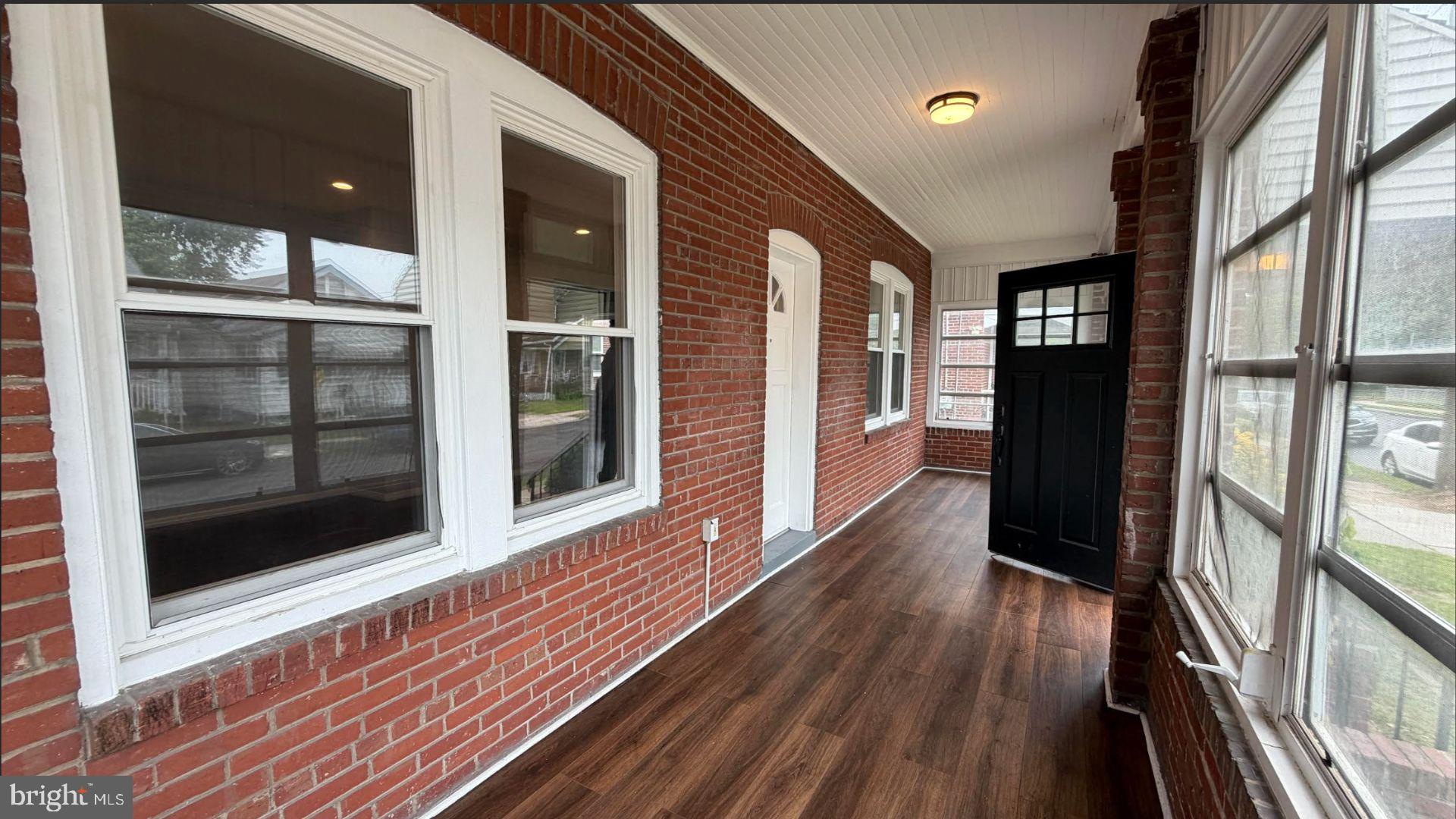 154 Andrew Street Hamilton, NJ 08610 - Photo 2 of 29 a view of a house with a large window