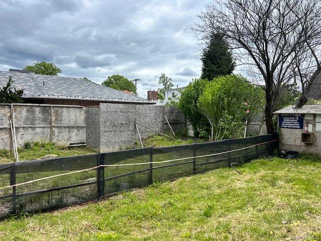 157-60 12th Road Queens, NY 11357 - Photo 4 of 10 a view of backyard with wooden fence