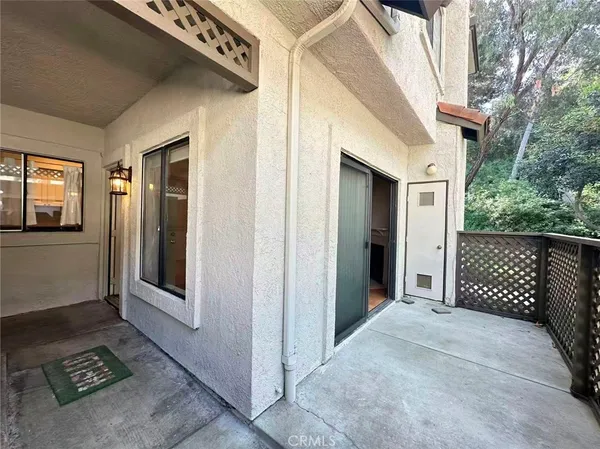 a balcony view with an outdoor space