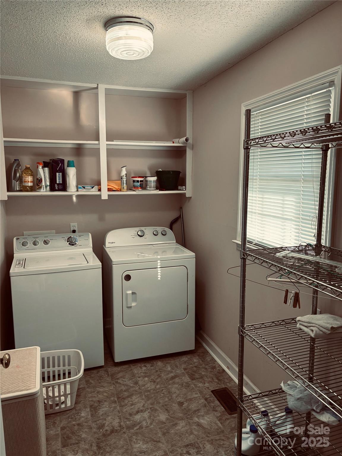 4211 Wolf Pond Road Monroe, NC 28112 - Photo 13 of 36 a utility room with dryer and washer