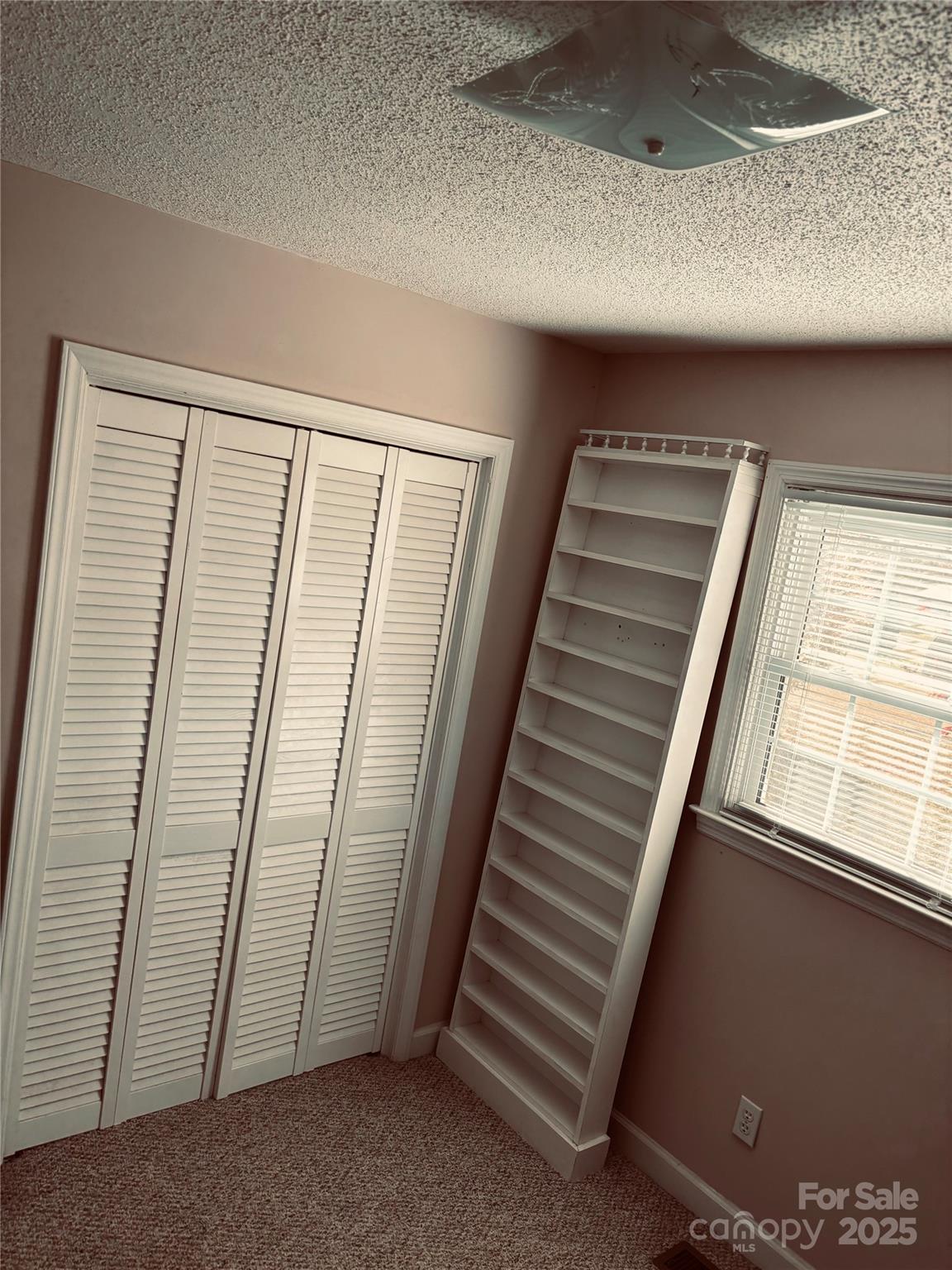 4211 Wolf Pond Road Monroe, NC 28112 - Photo 26 of 36 a view of empty room with stairs