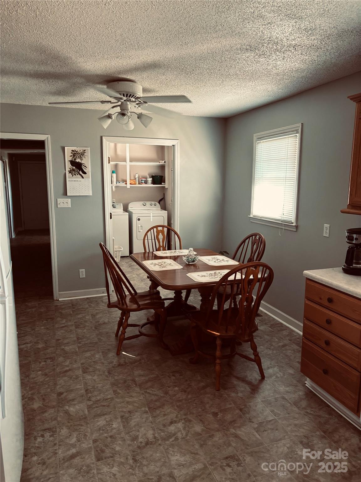 4211 Wolf Pond Road Monroe, NC 28112 - Photo 10 of 36 a view of a dining room with furniture window and wooden floor