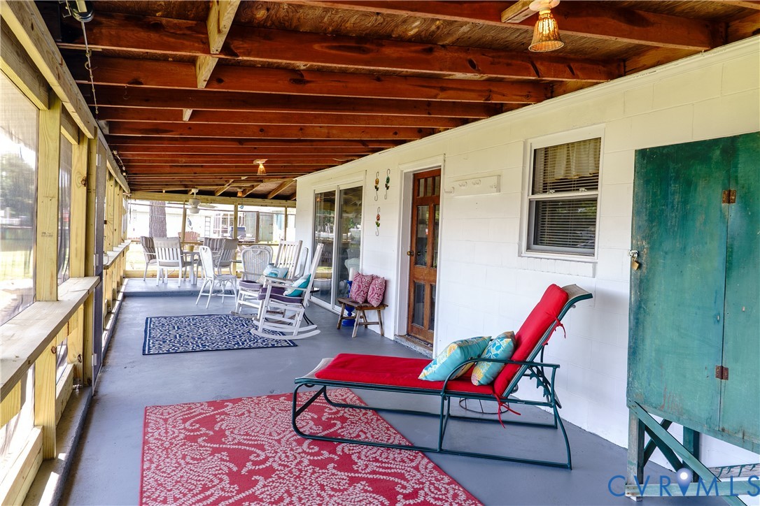 1280 Little Florida Road Farnham, VA 22460 - Photo 31 of 41 Expansive screened porch with exposed wood beam ce