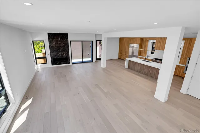 a view of livingroom with hardwood and front door