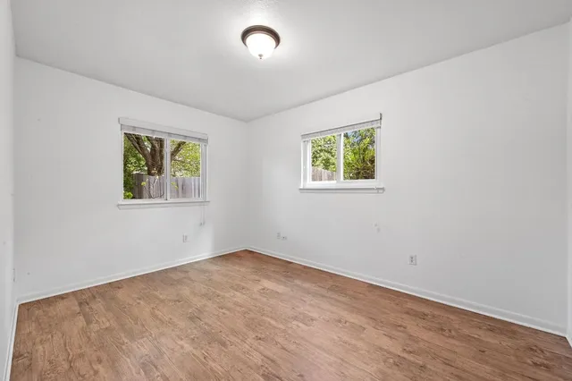 an empty room with windows