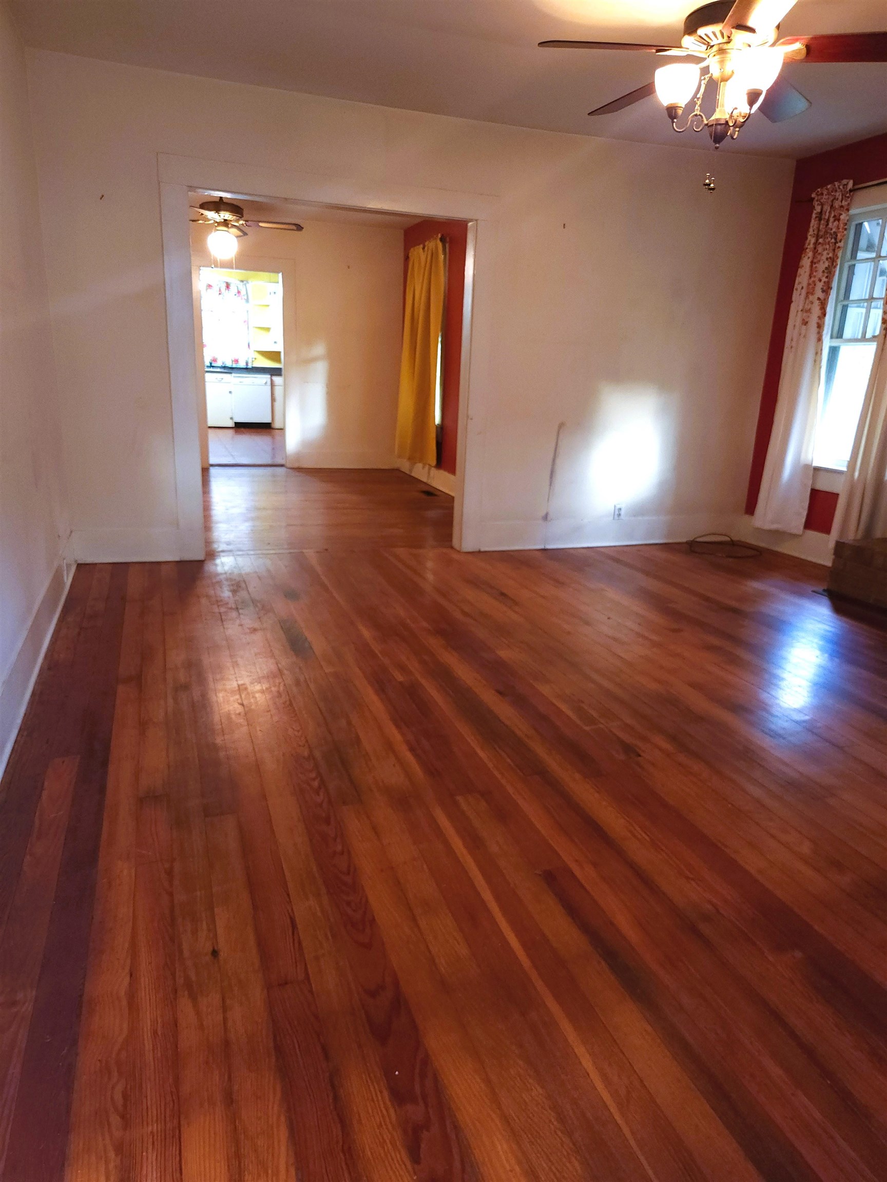 450 Fletcher Road Collierville, TN 38017 - Photo 16 of 25 a view of empty room with wooden floor and fan
