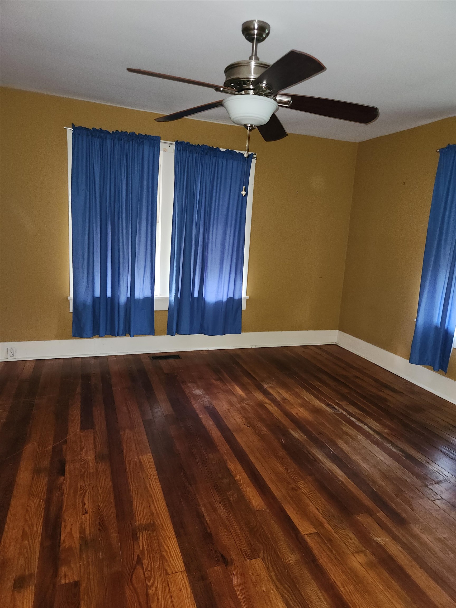 450 Fletcher Road Collierville, TN 38017 - Photo 19 of 25 a view of wooden floor and chandelier fan in a room