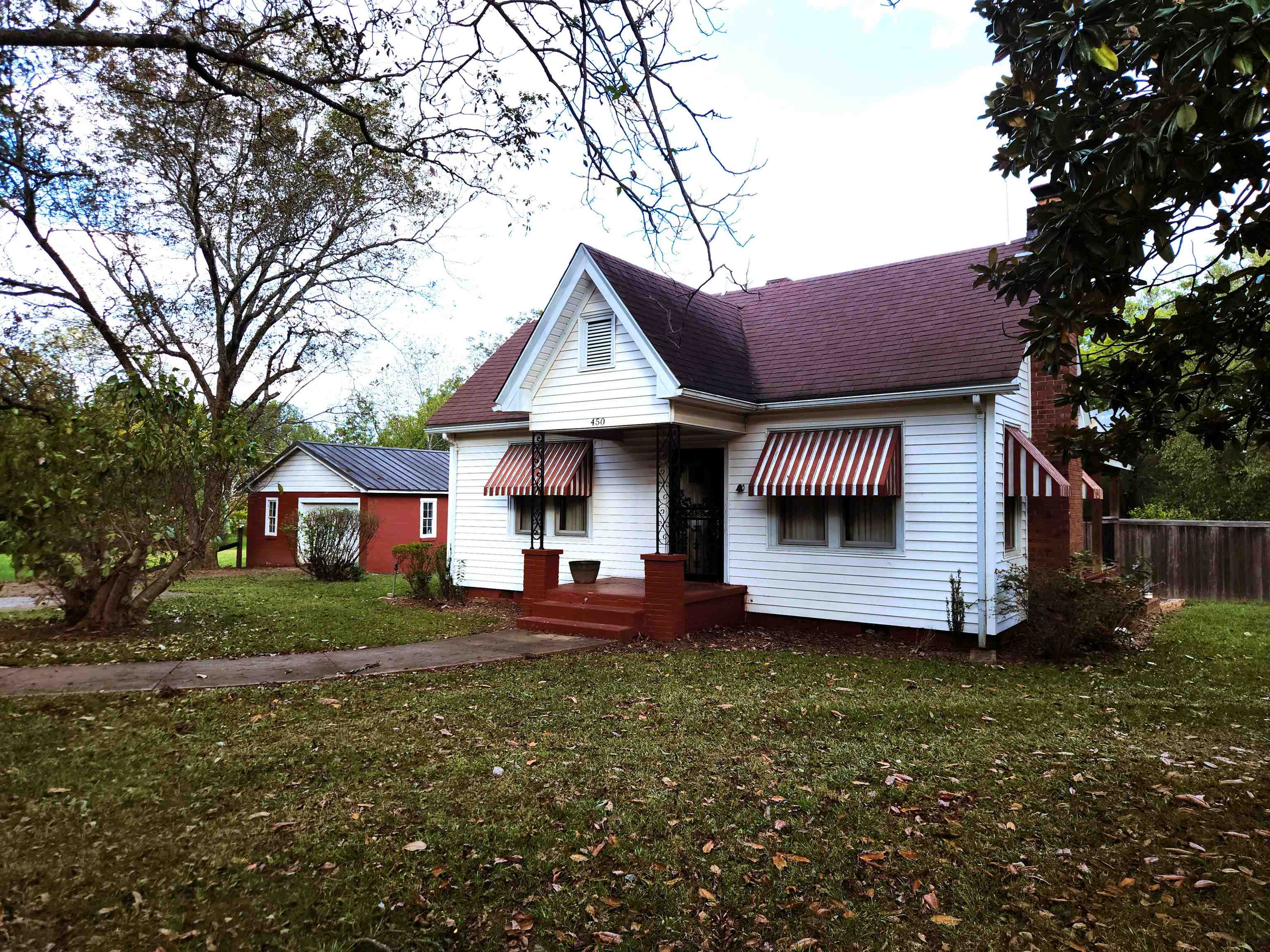 450 Fletcher Road Collierville, TN 38017 - Photo 6 of 25 a front view of a house with a garden