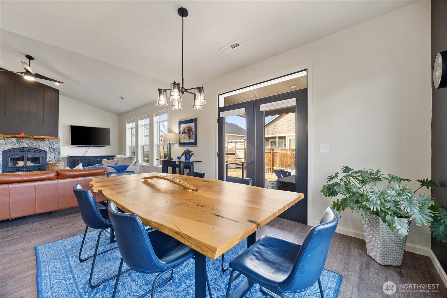 457 Whisper Place Chelan, WA 98816 - Photo 18 of 40 a view of a dining room with furniture window and wooden floor
