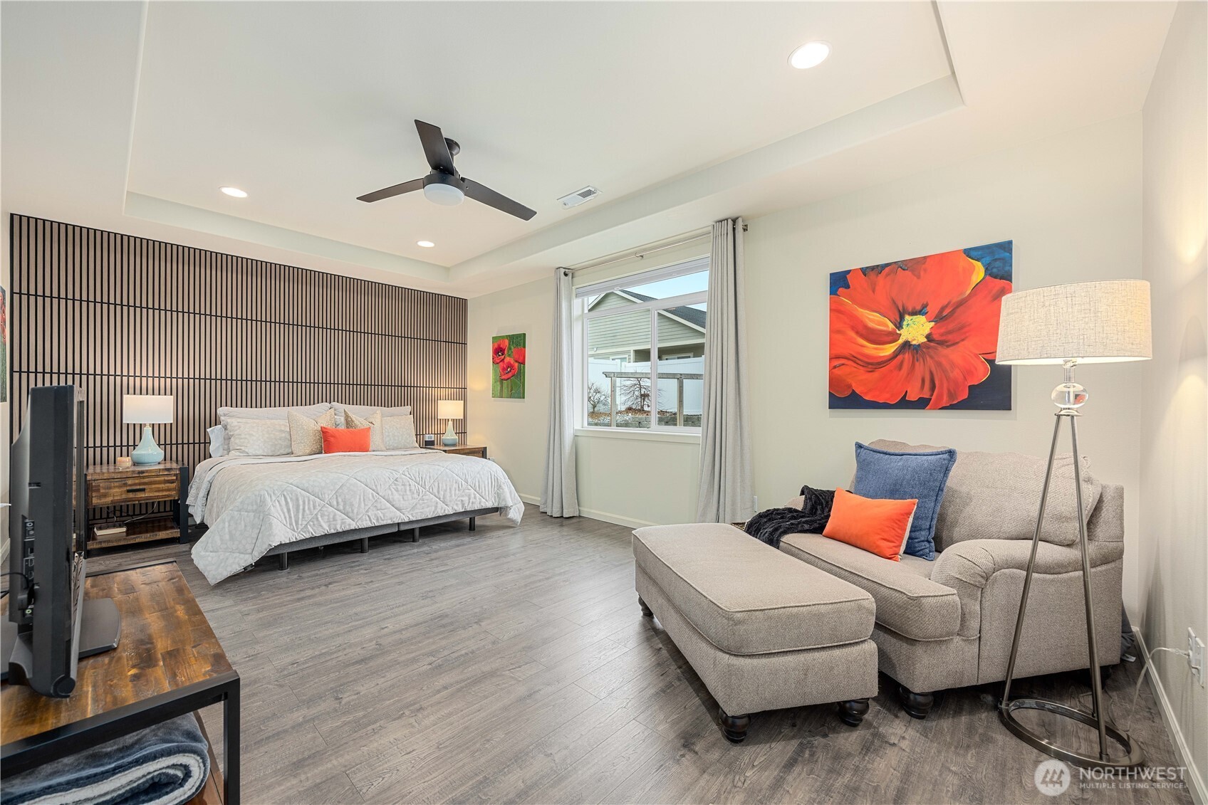 457 Whisper Place Chelan, WA 98816 - Photo 25 of 40 a bedroom with a bed and window