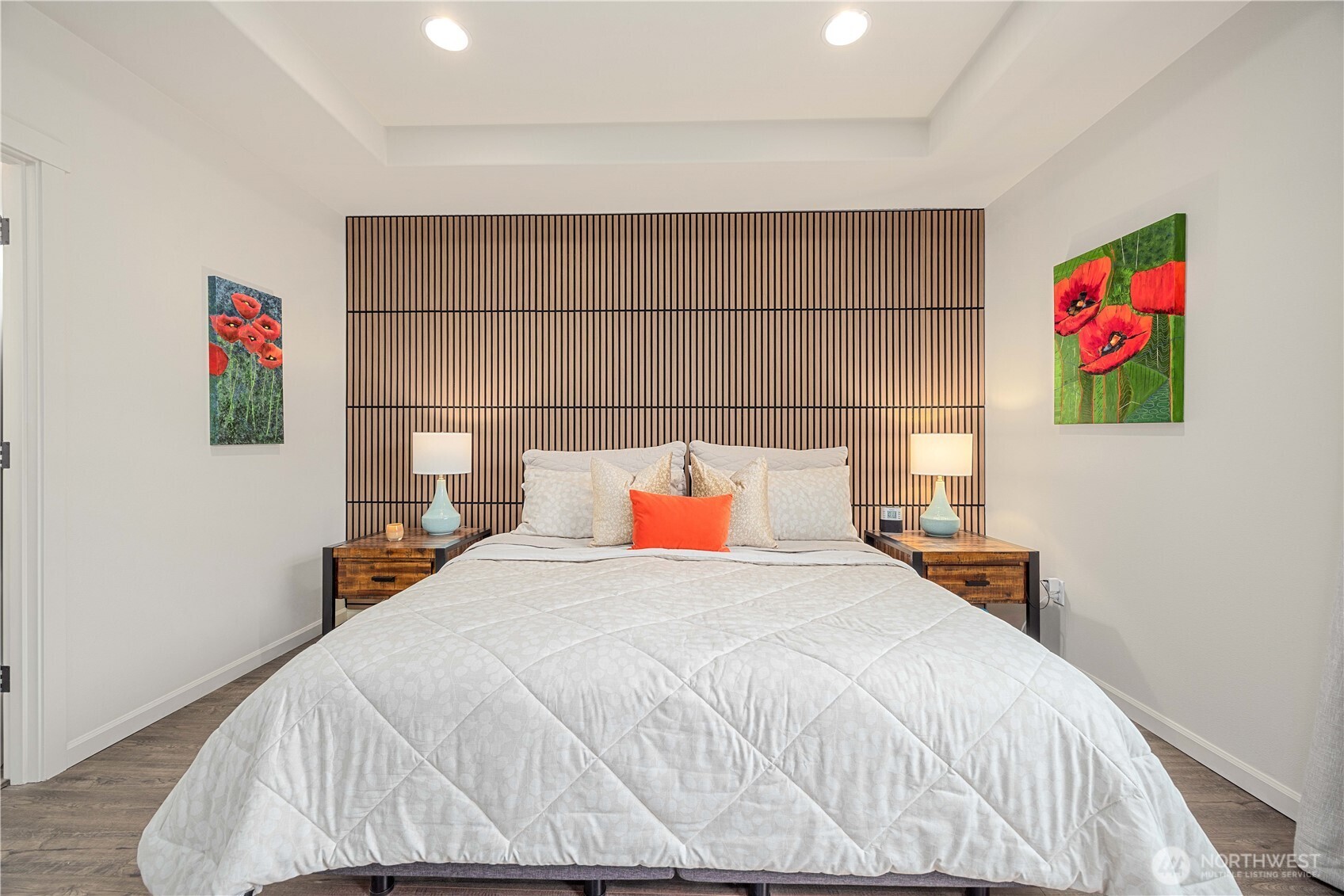 457 Whisper Place Chelan, WA 98816 - Photo 26 of 40 a bedroom with a bed and cabinets