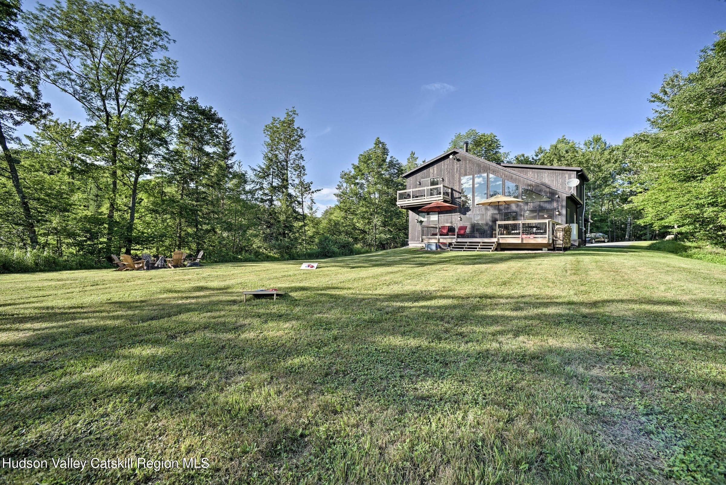 205 Nauvoo Road Windham, NY 12496 - Photo 1 of 31 a view of a house with a big yard