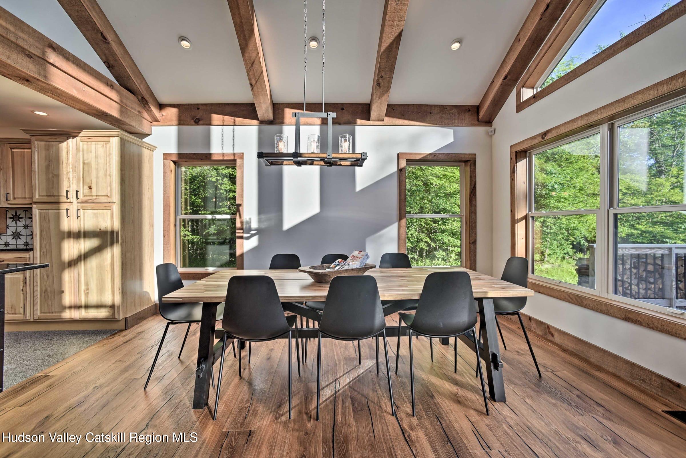 205 Nauvoo Road Windham, NY 12496 - Photo 11 of 31 a dining room with furniture window wooden floor